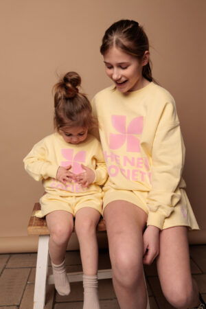 the new society logo sweater soft lemon bp a by te